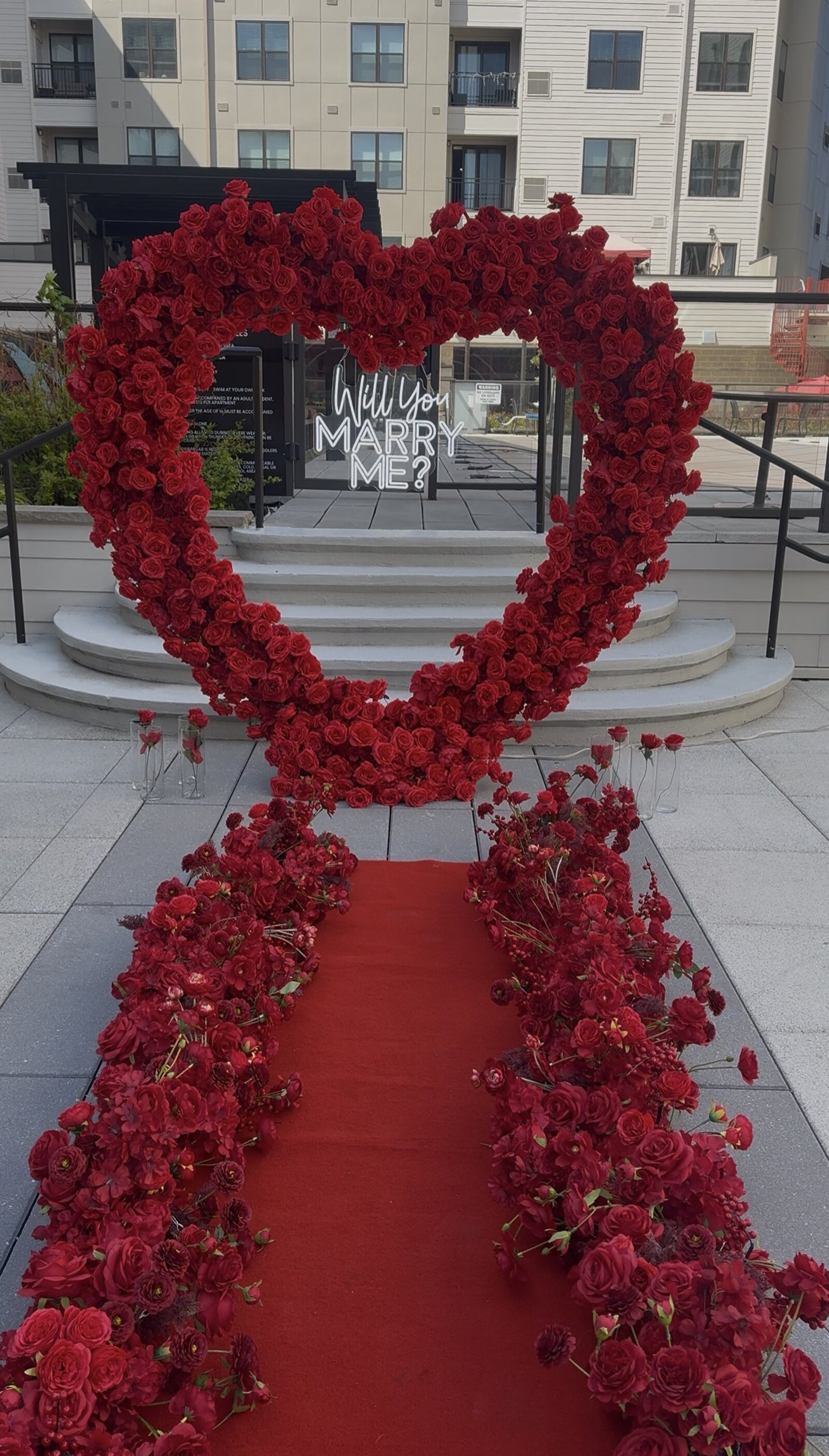 Will You Marry Me heart rose arch proposal